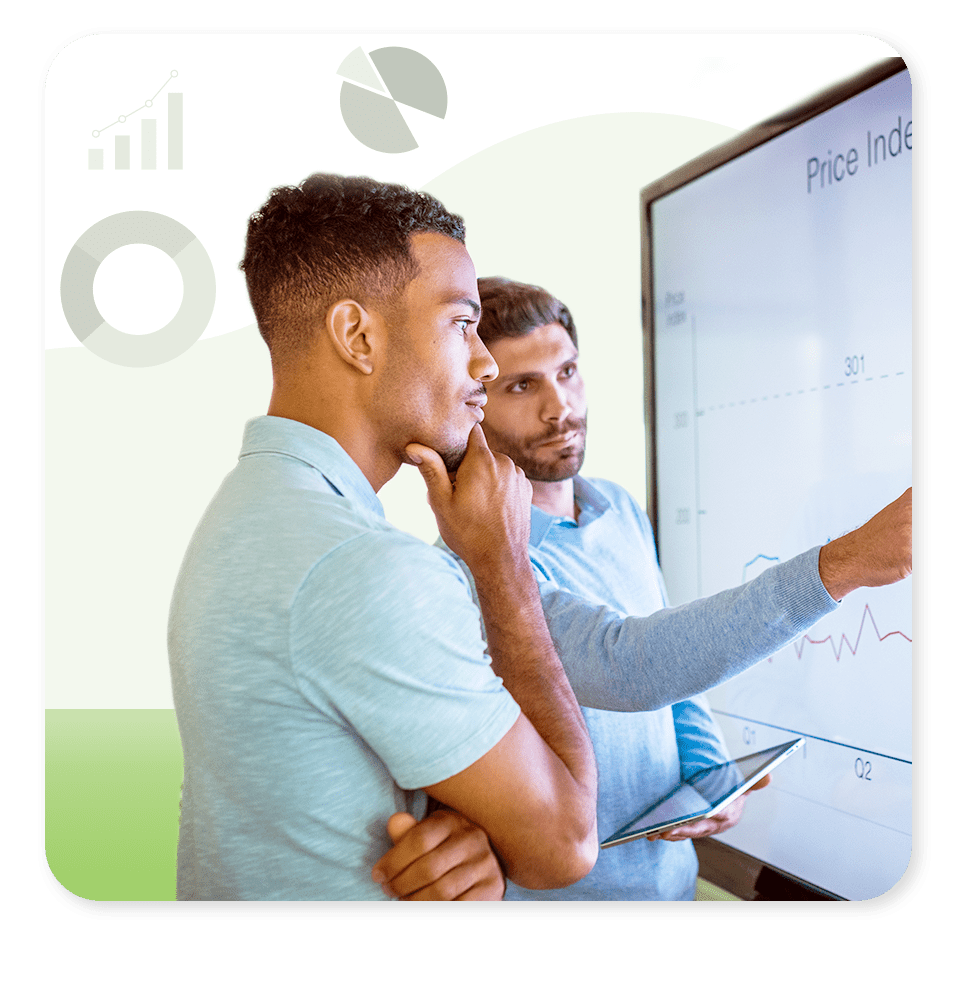 Two marketing department men looking at analytics and reporting charts